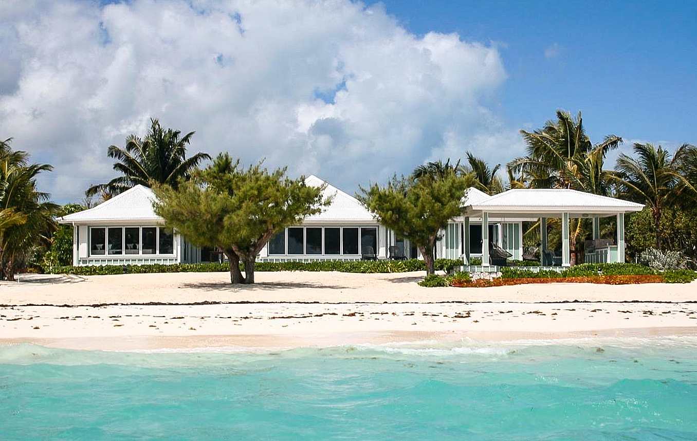 vacation home with folding glass windows with windload resistance for hurricane season