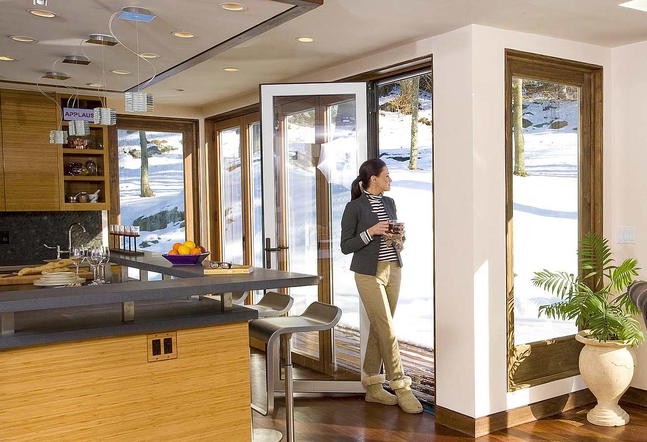 winter getaway design inspiration with folding glass doors