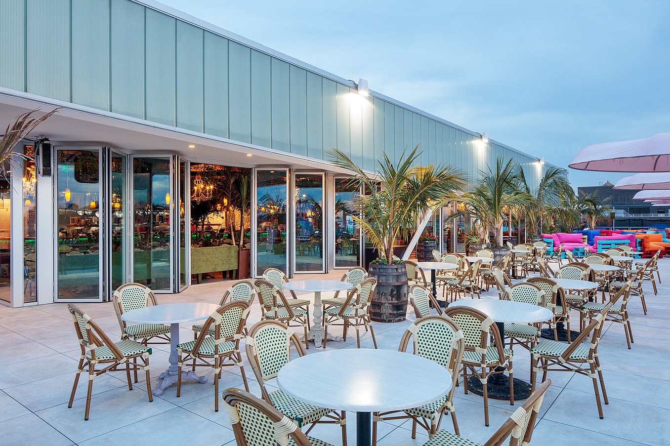 commercial folding glass doors in rooftop restaurant