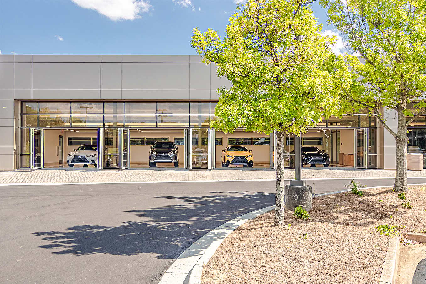 Lexus auto showroom with NanaWall commercial folding glass doors