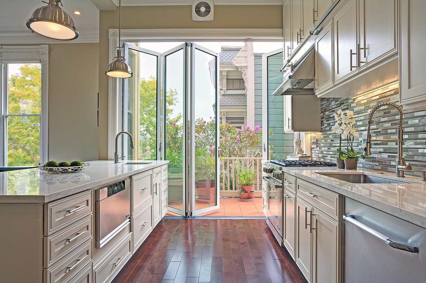 modern kitchen with folding glass wall