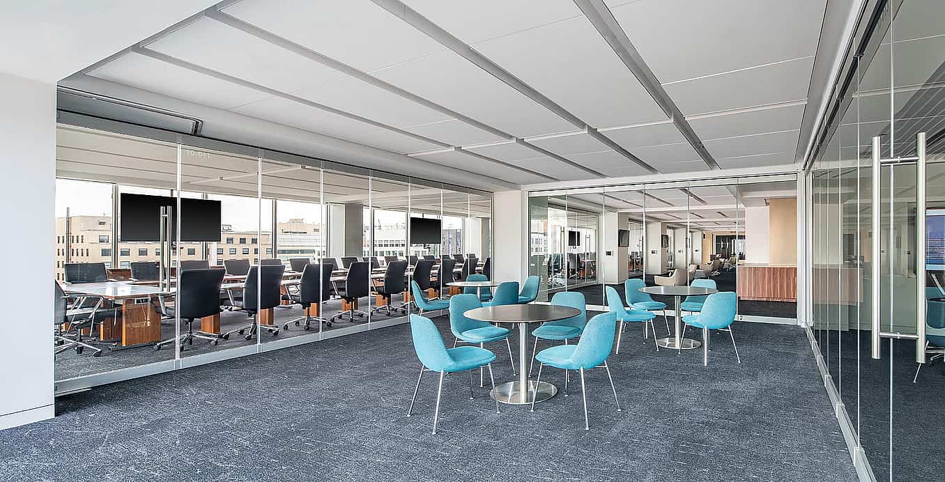 three-walls-of-frameless-glass-walls-in-office