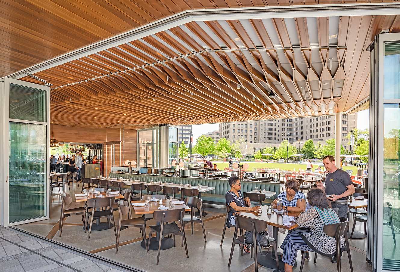 indoor-outdoor restaurant design with NanaWall commercial glass doors