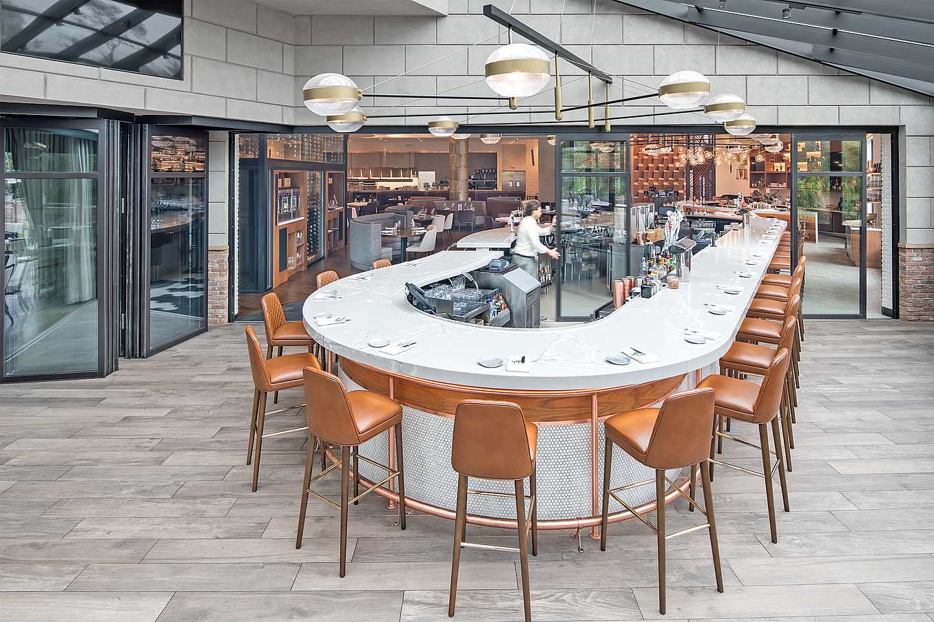 open layouts in restaurant design with NanaWall movable glass wall systems