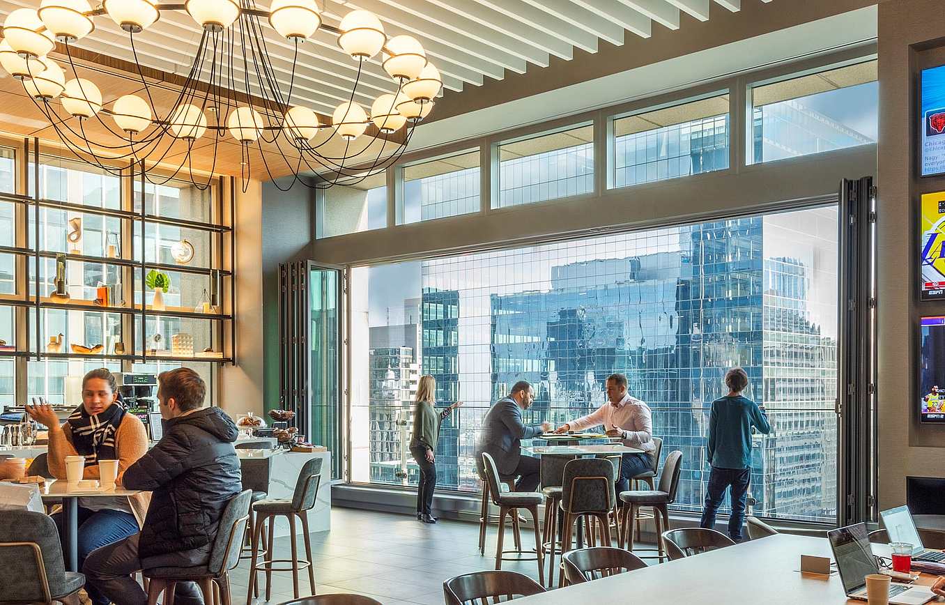 workplace design with amenities and opening glass door