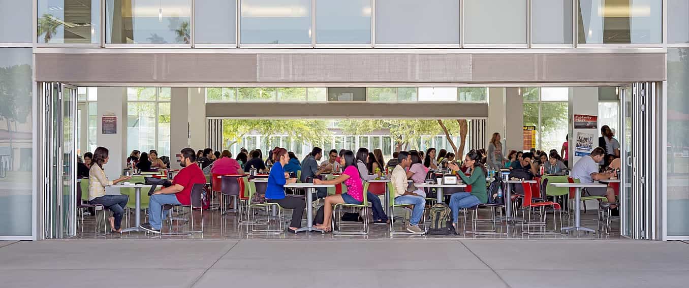 arizona western university indoor/outdoor cafateria with two folding glass walls for fresh air 