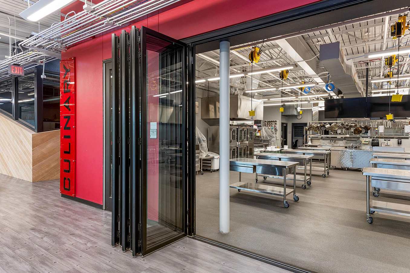 close up of folding glass doors in high school career center for culinary arts