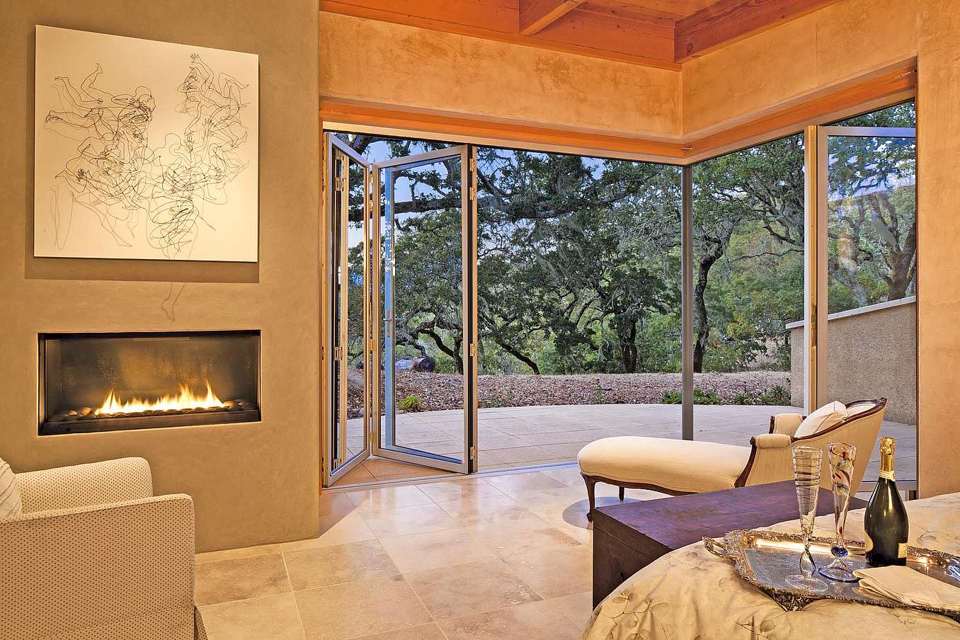 bedroom with open corner design with folding doors