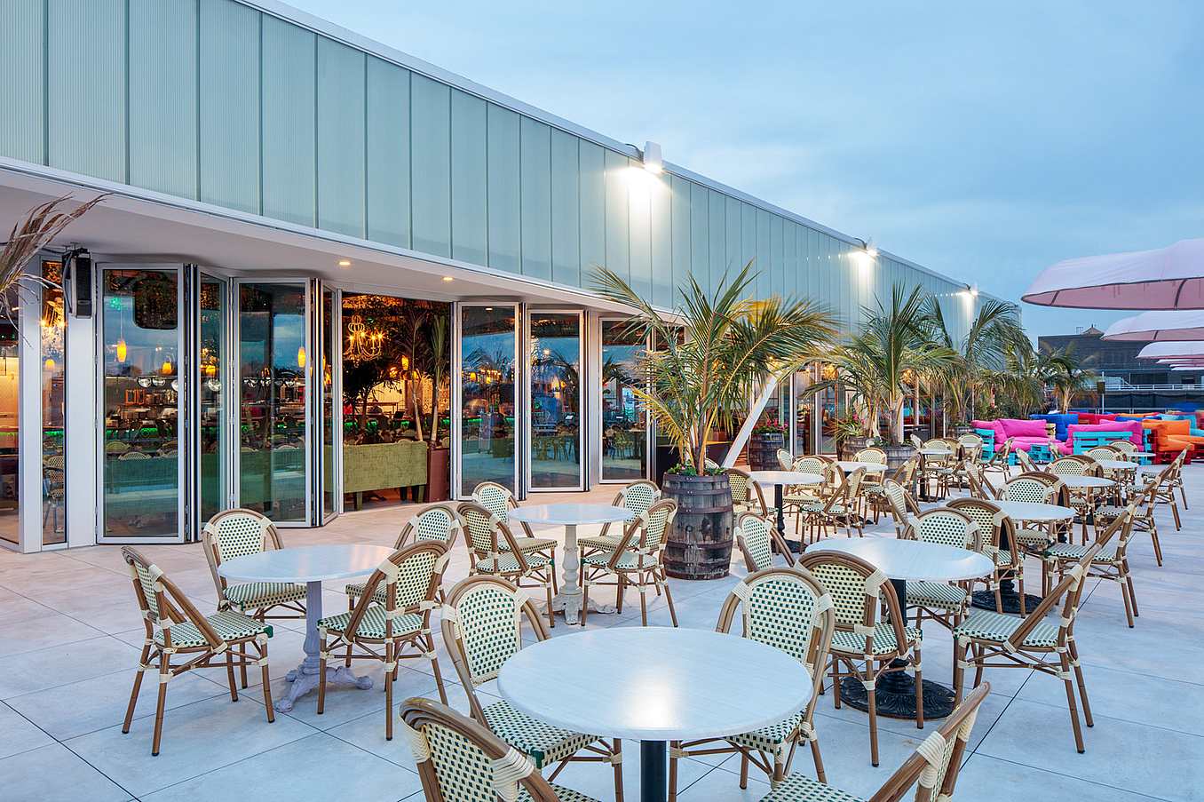 commercial folding glass doors in rooftop restaurant