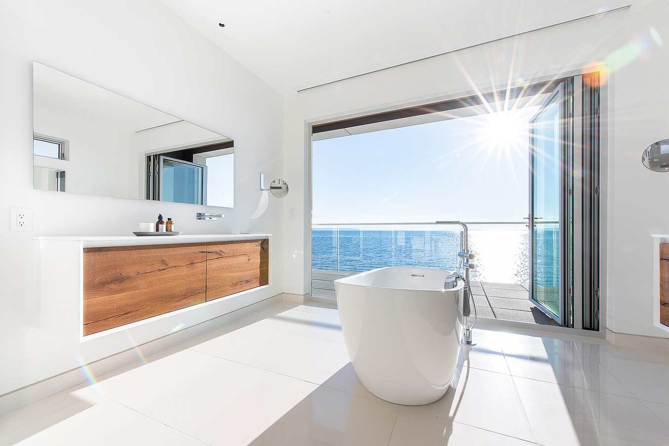 folding glass wall systems in bathroom design