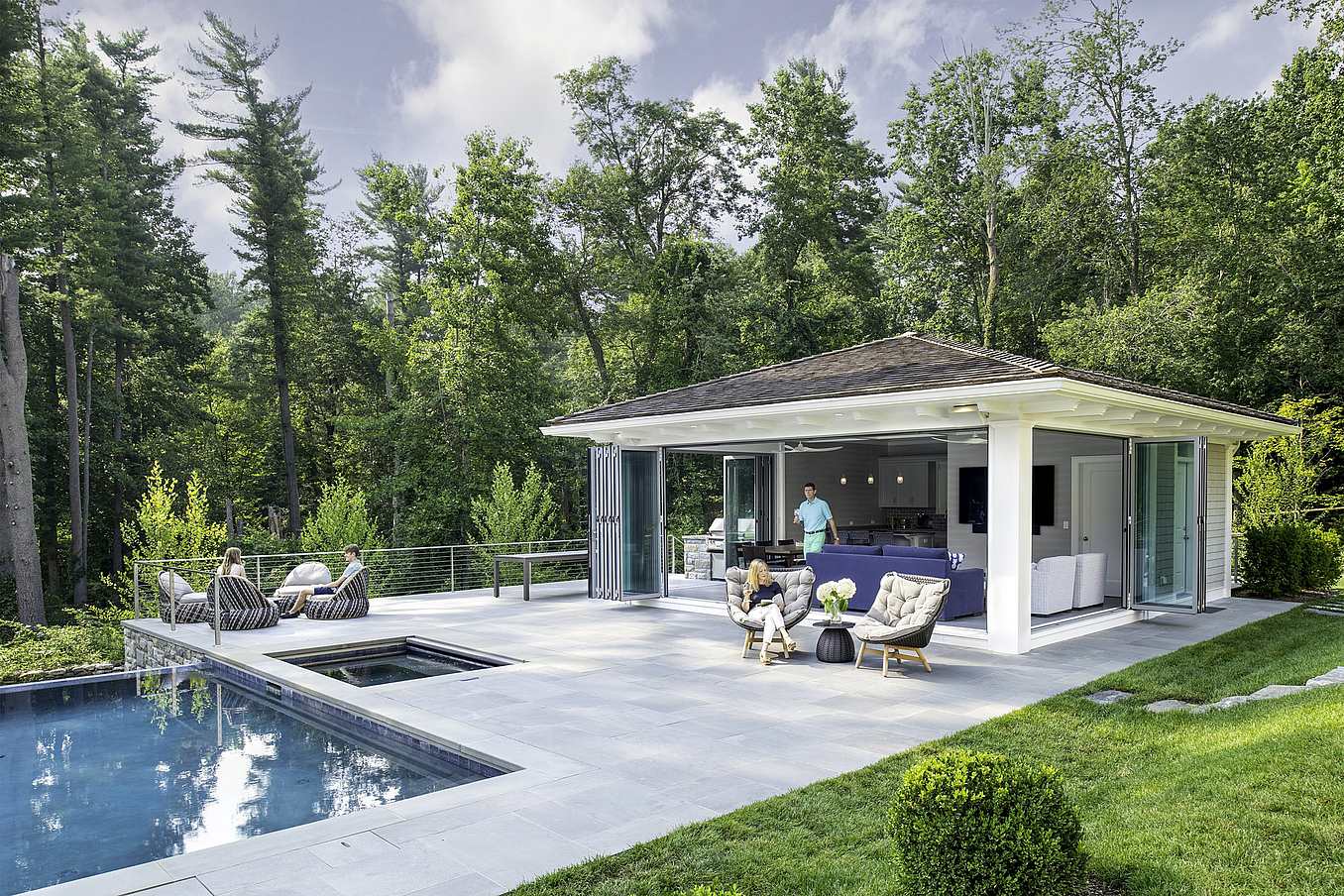 pool house with NanaWall folding glass walls