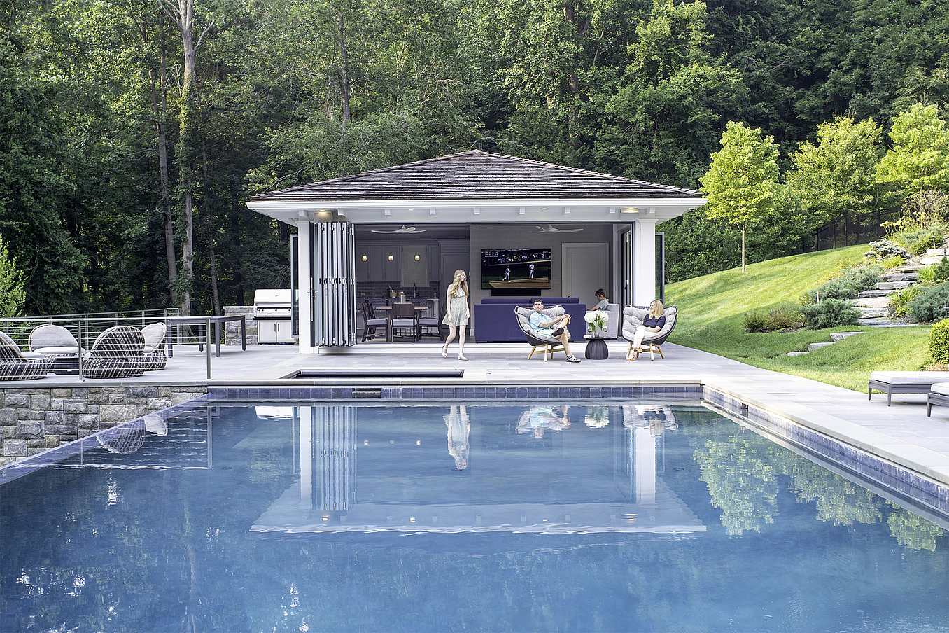 NanaWall folding glass wall systems in pool house design