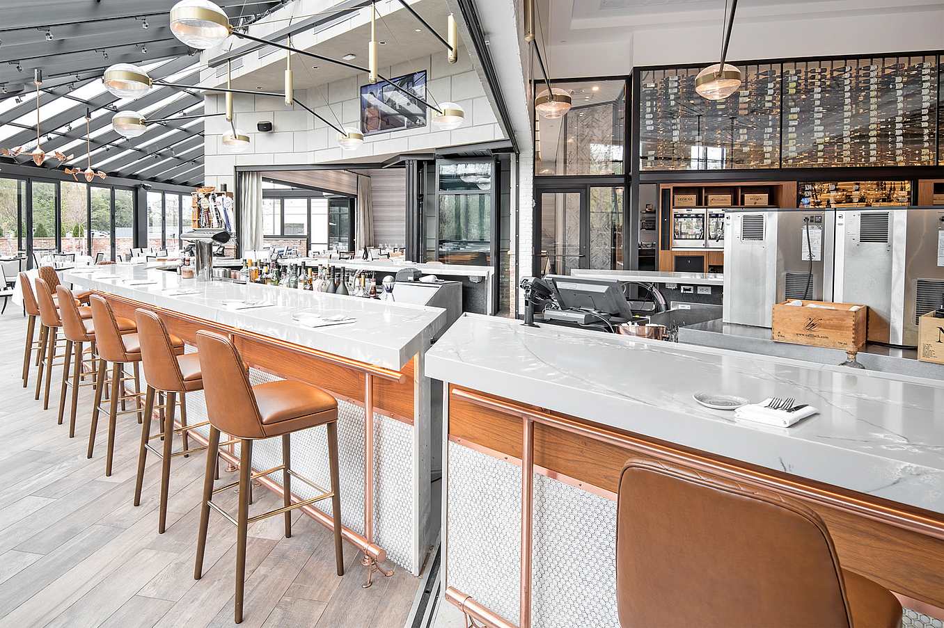 sliding glass wall bisects bar