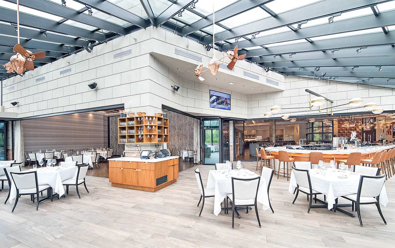 indoor outdoor dining with sliding glass wall design