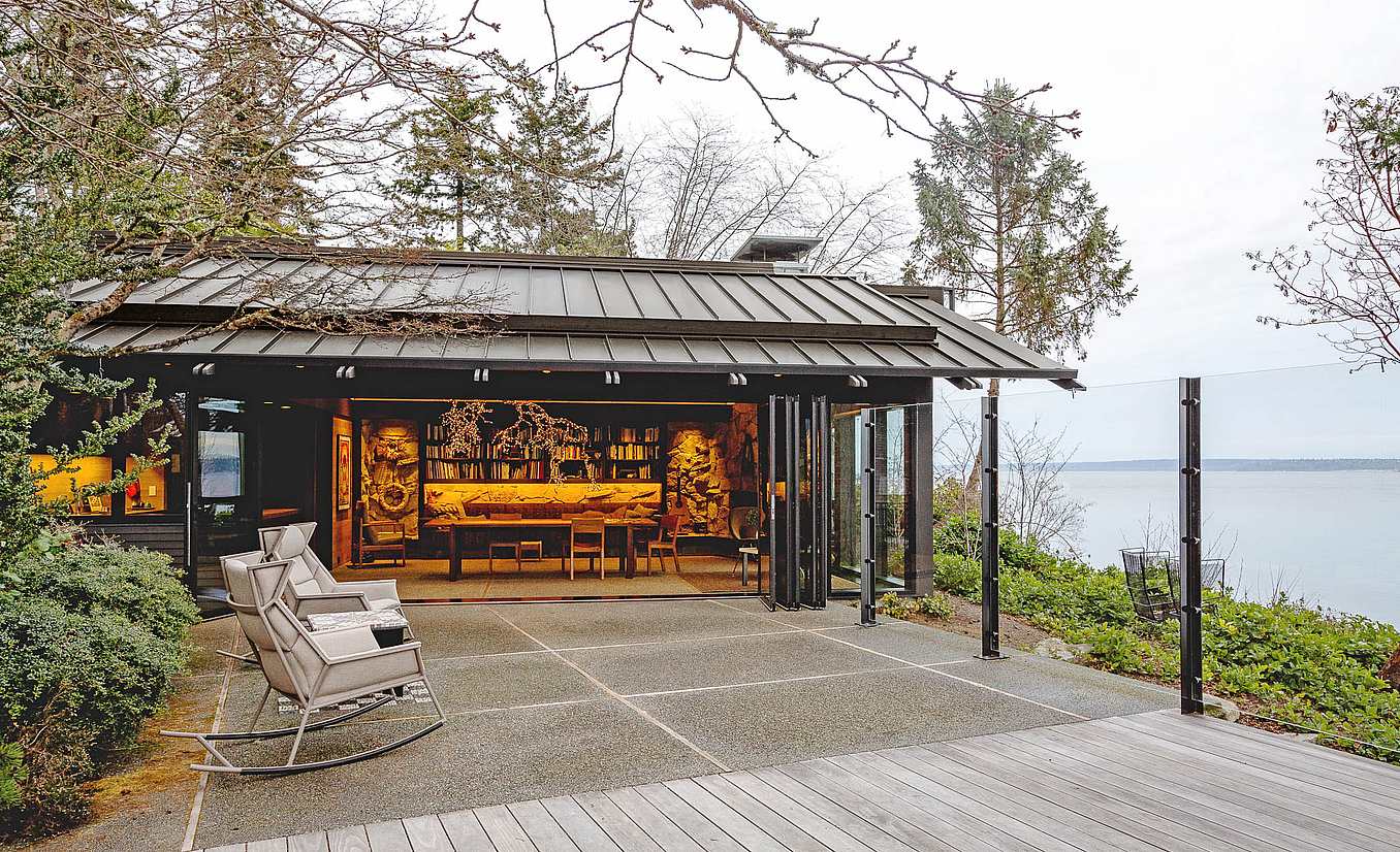 sustainable home renovation with bifold glass walls