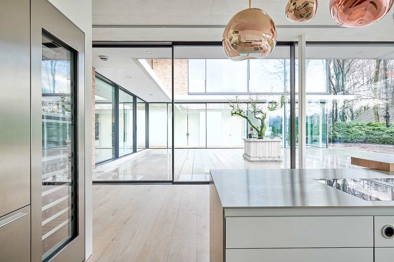 minimal sliding glass walls in residential design
