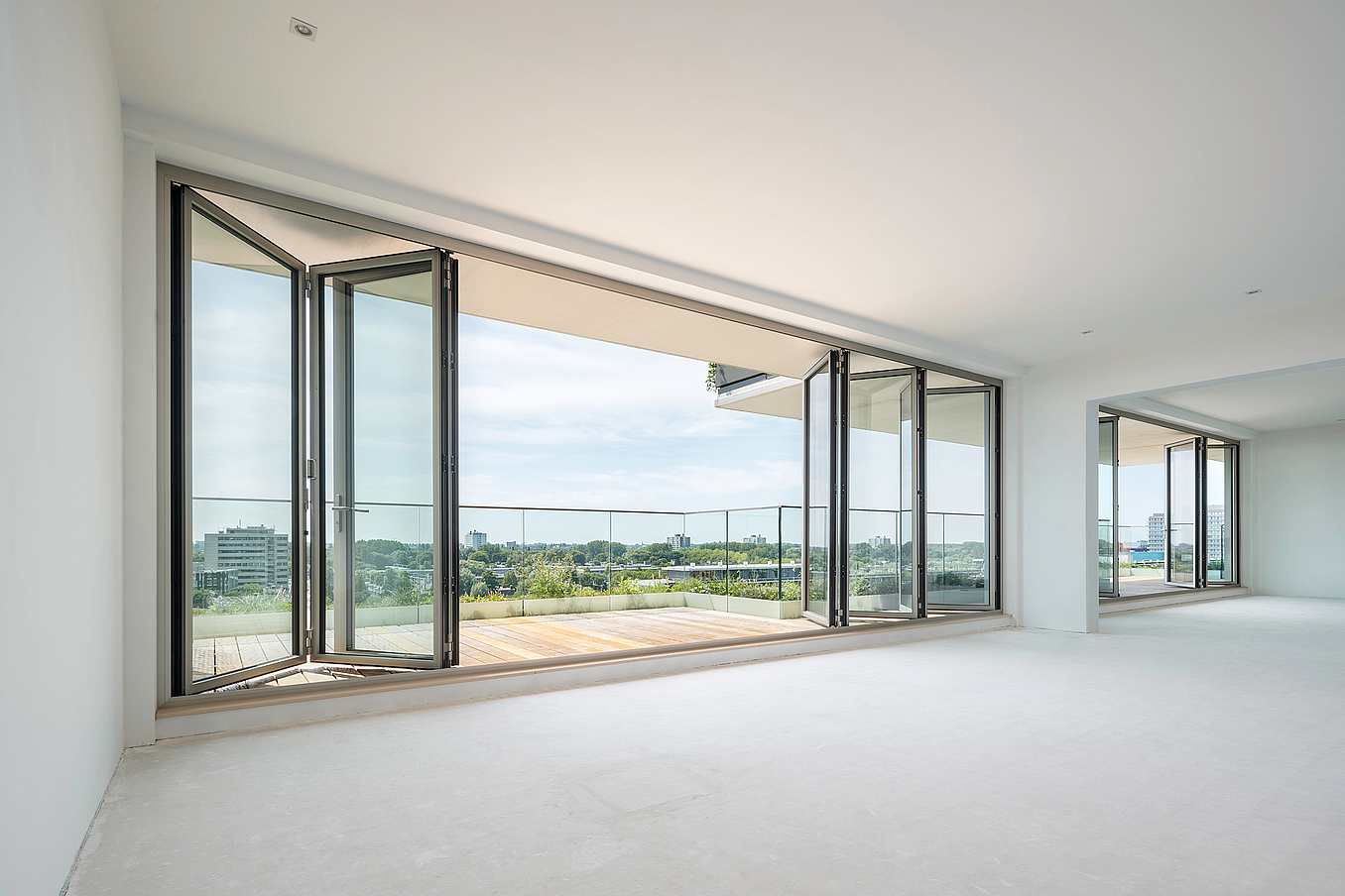 Folding glass wall systems multifamily