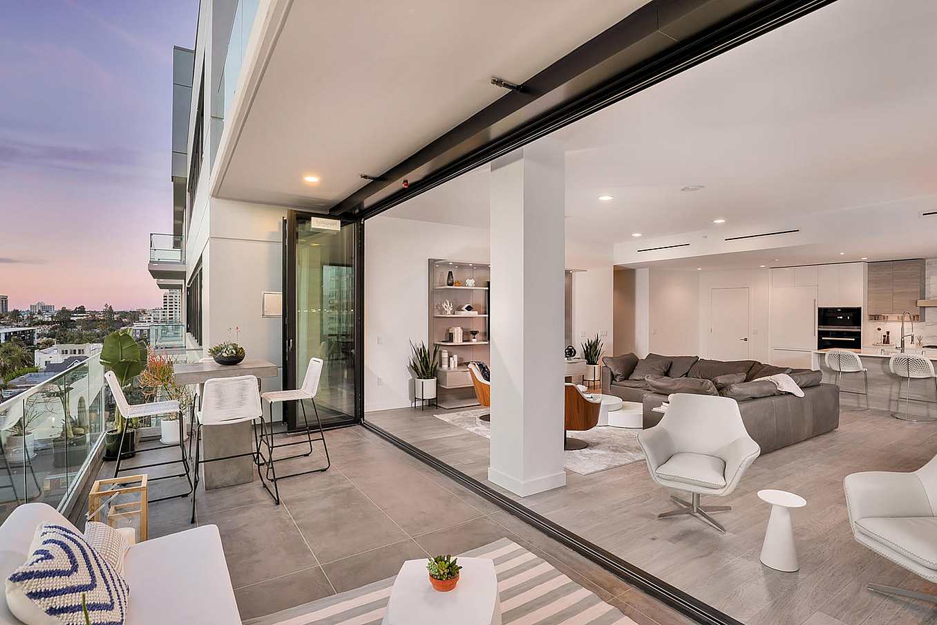 high performance folding glass walls for multifamily buildings