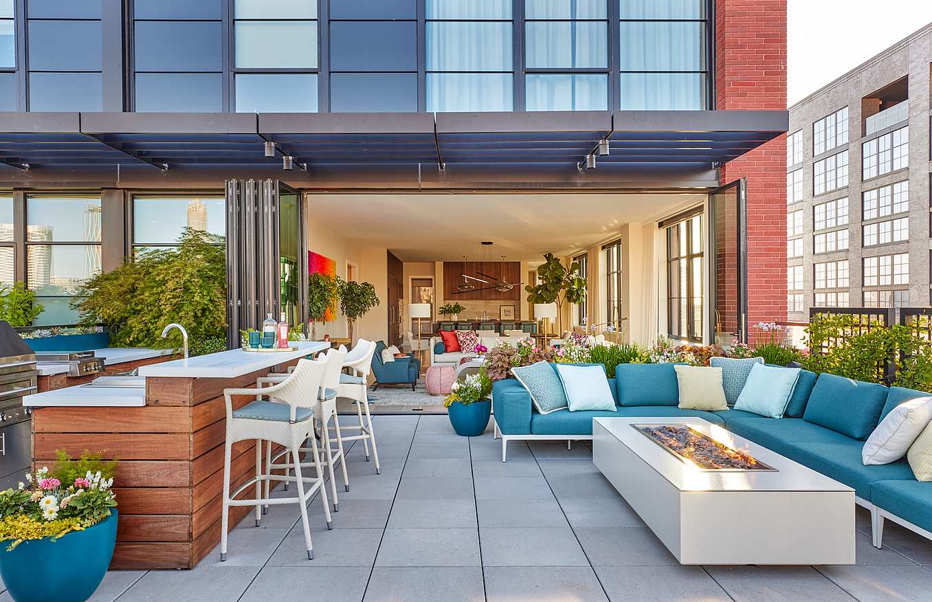 multifamily rooftop penthouse folding glass walls 