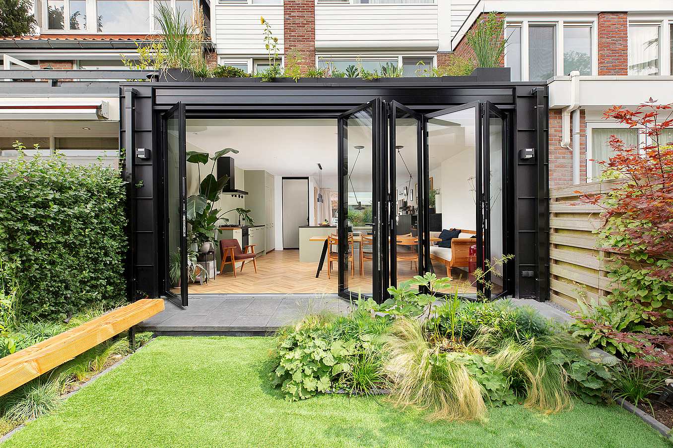Folding glass walls fresh air daylight sustainable design