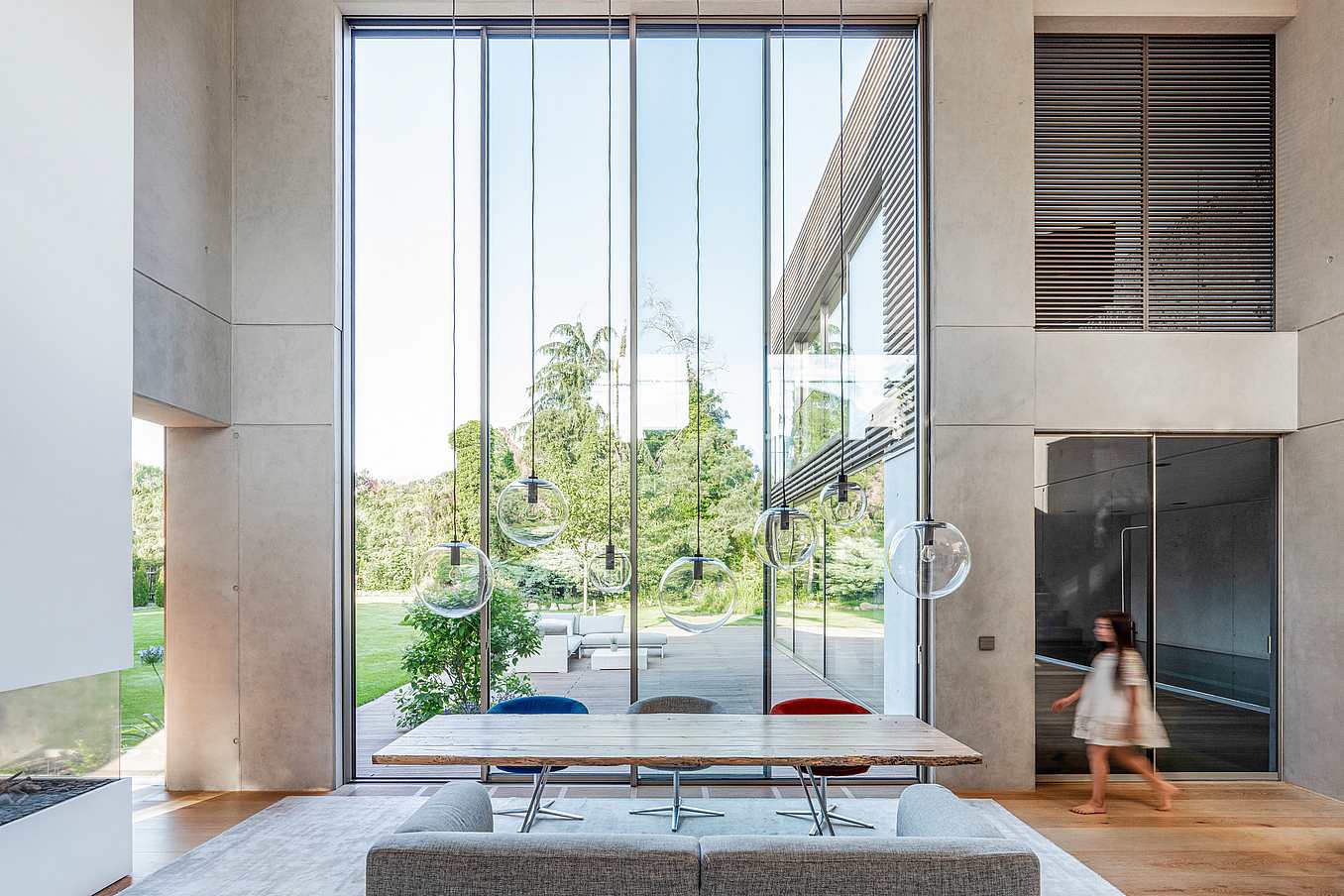 double-height ceiling minimal sliding glass door system