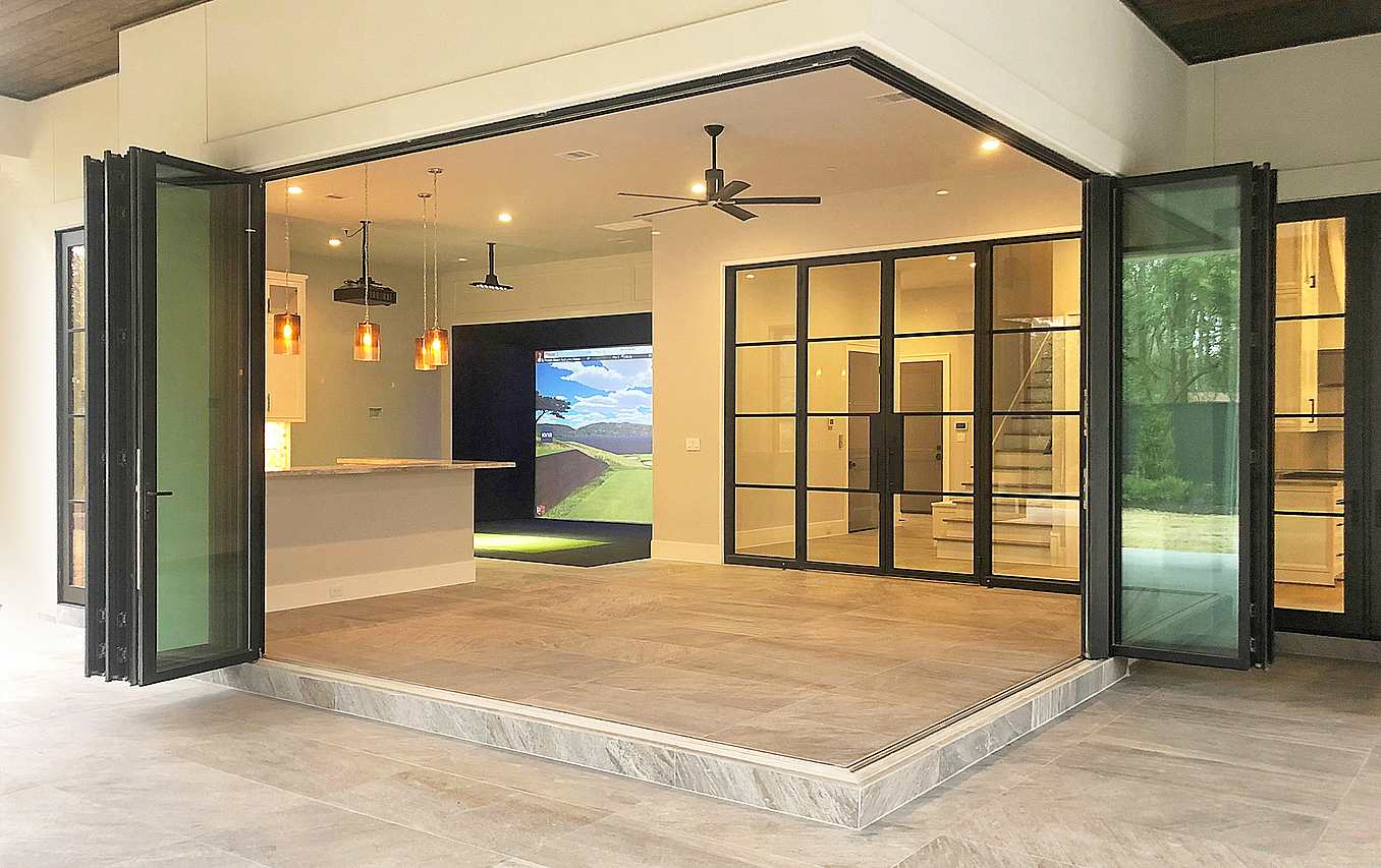 Custom home with residential folding glass door systems