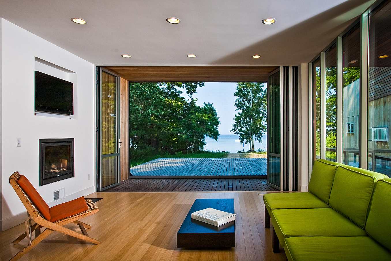 Wide-Open-Folding-Glass-Wall-in-Living-Room