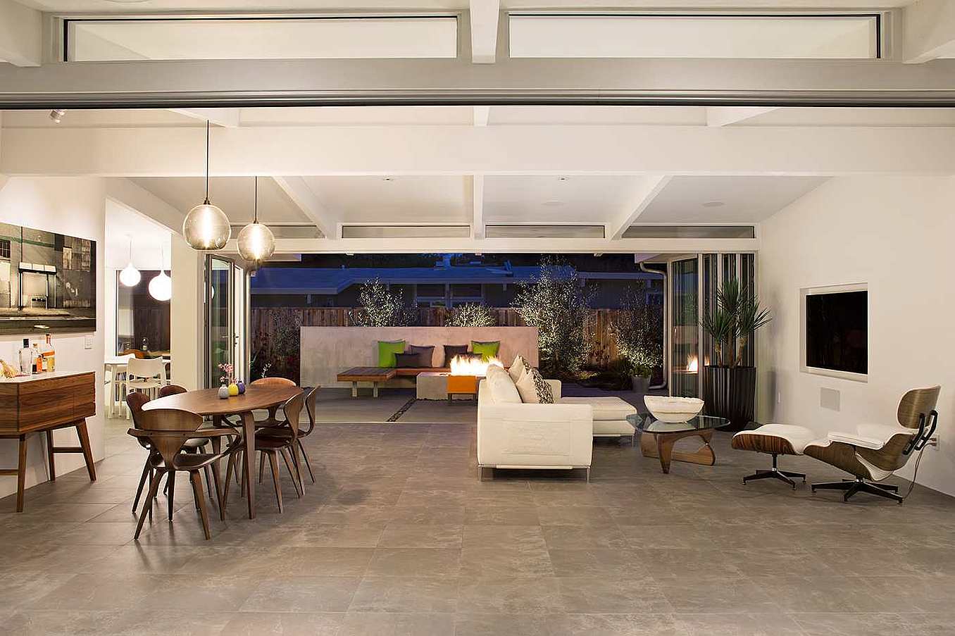 Eicher-interior-living-room-renovasion-with-Eames-chair-and-folding-glass-wall