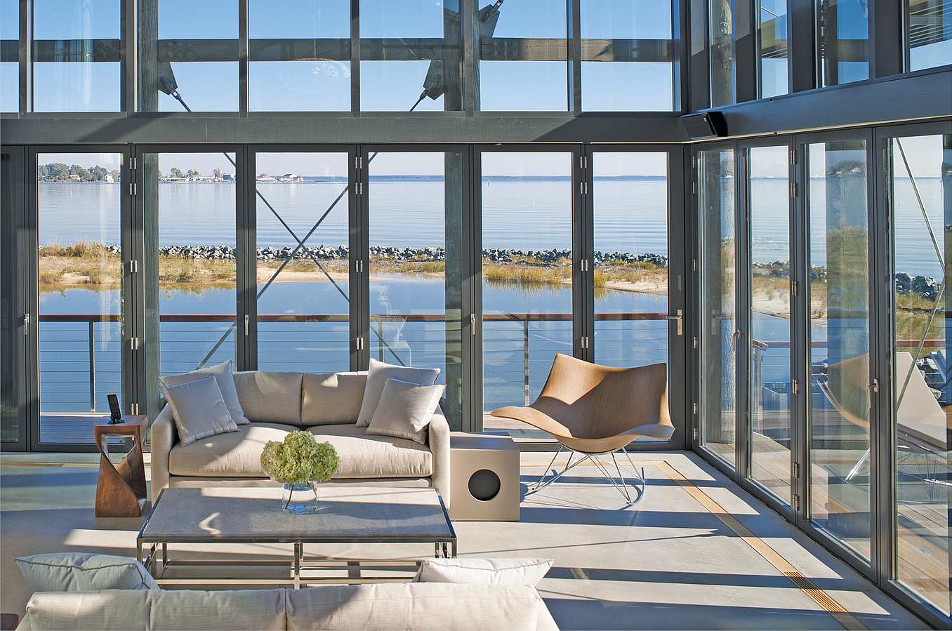 how to design a resilient home with  opening glass doors