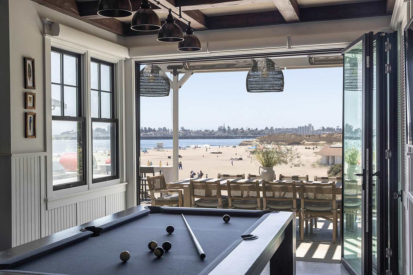 Bifold glass door by NanaWall in Santa Cruz seaside cottage