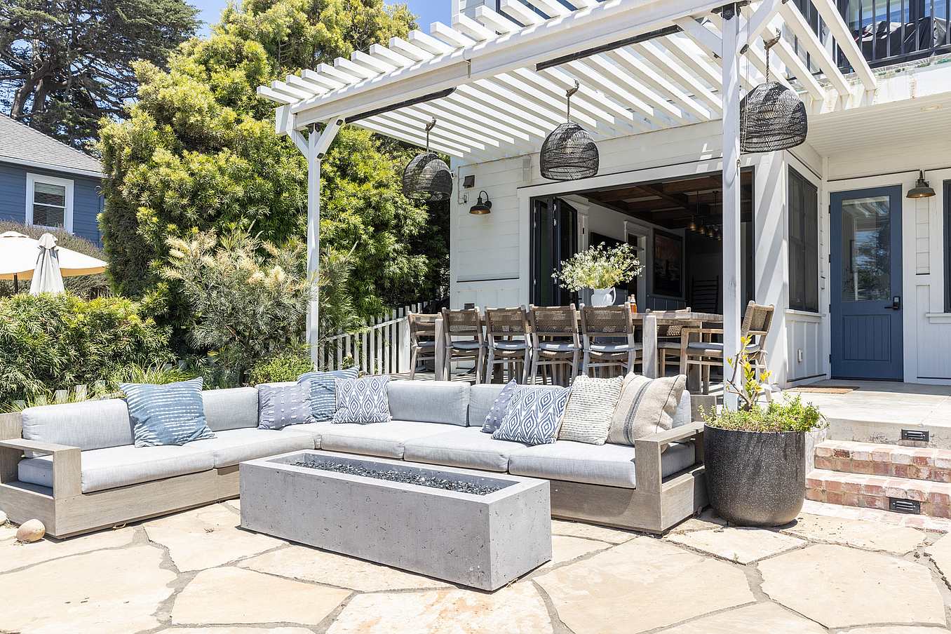indoor-outdoor living in seaside cottage with NanaWall bifold glass door