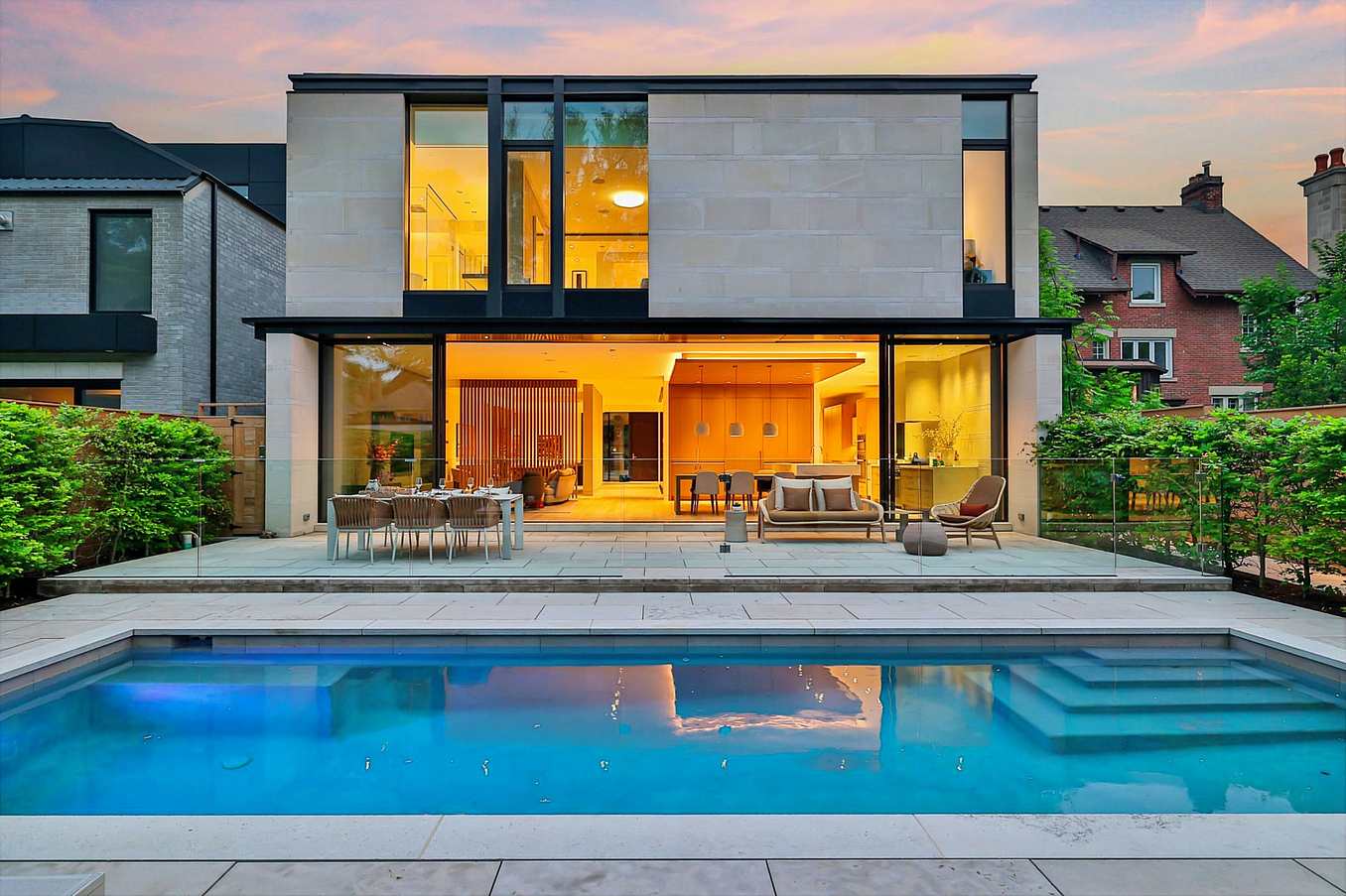 back view of Infinity House with large minimal sliding glass wall