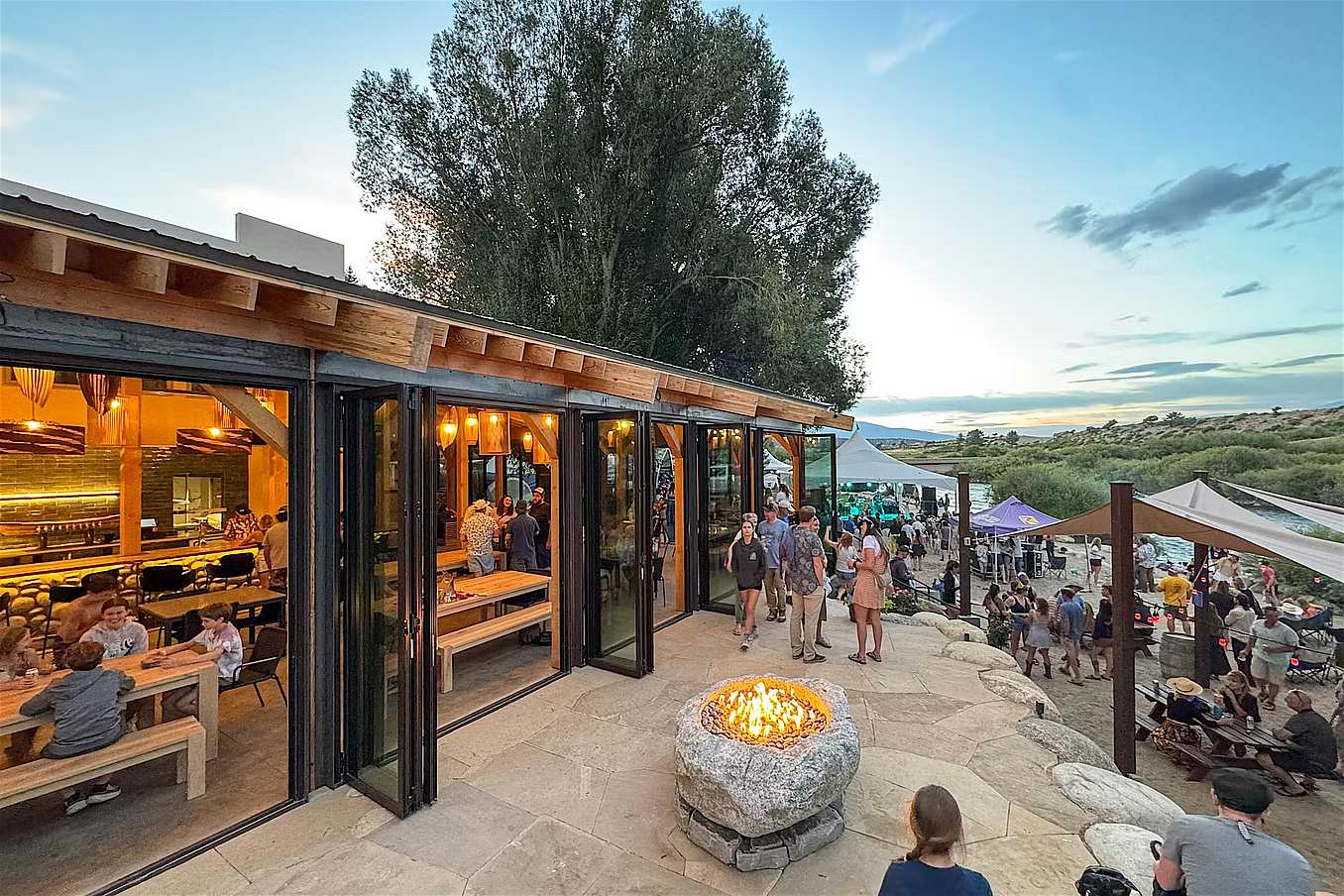 Commercial design winner with folding glass walls in restaurant