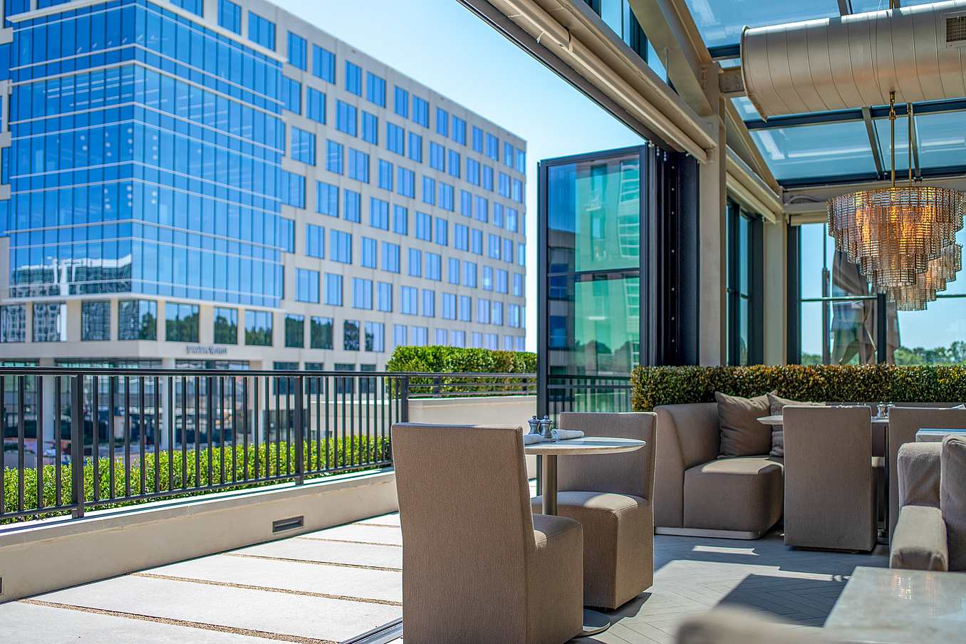 NanaWall rooftop commercial glass door with steel effect by NanaWall Systems