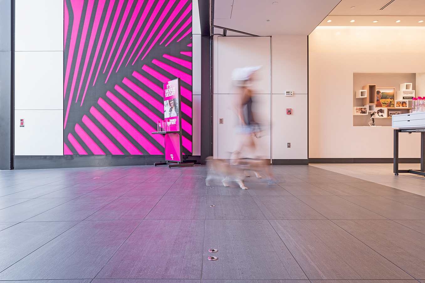 retail storefront desing with NanaWall commercial glass door