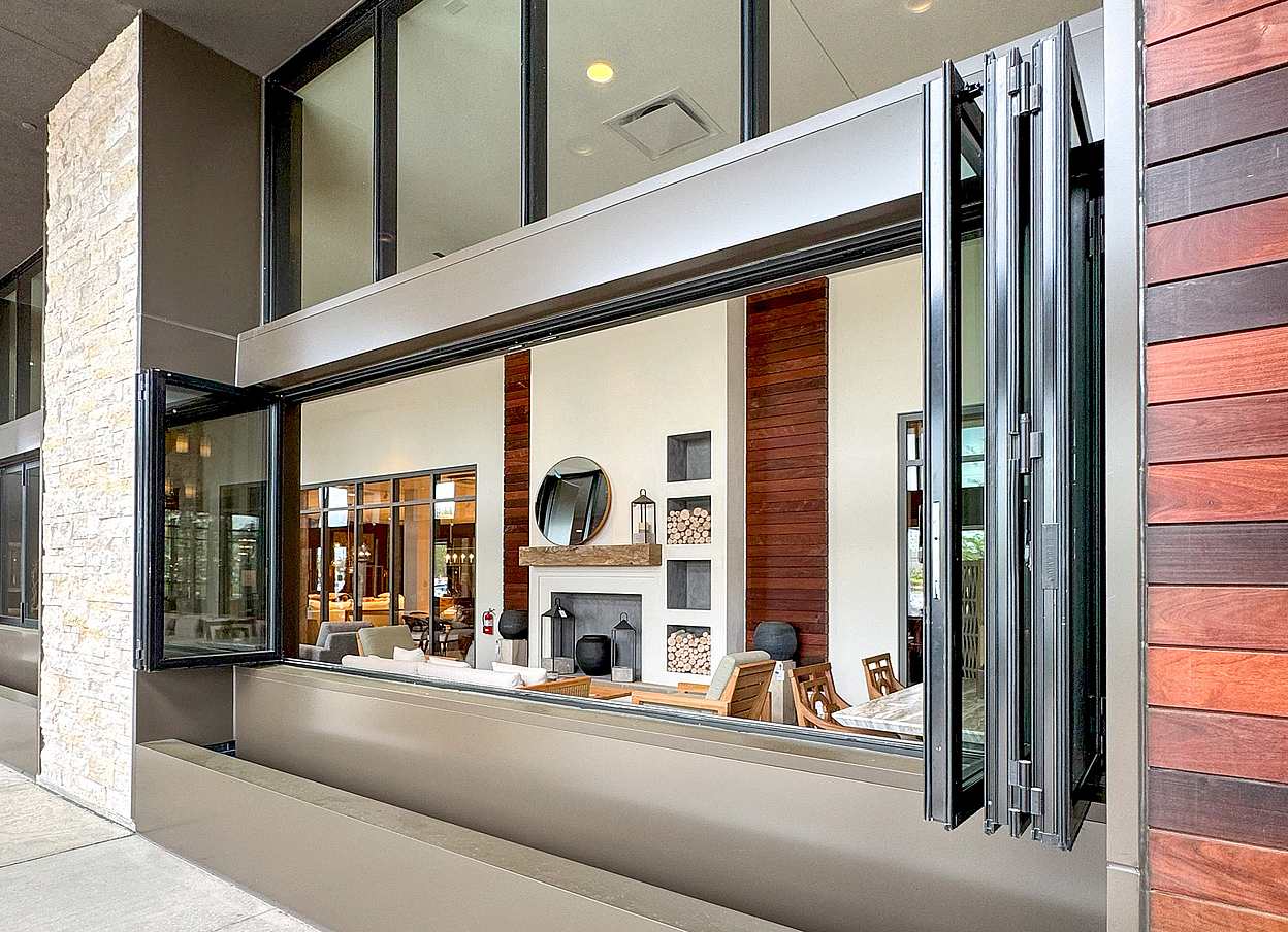 NanaWall folding window in retail storefront furniture store esign