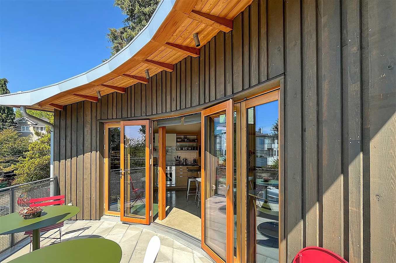 segmented curve opening glass wall