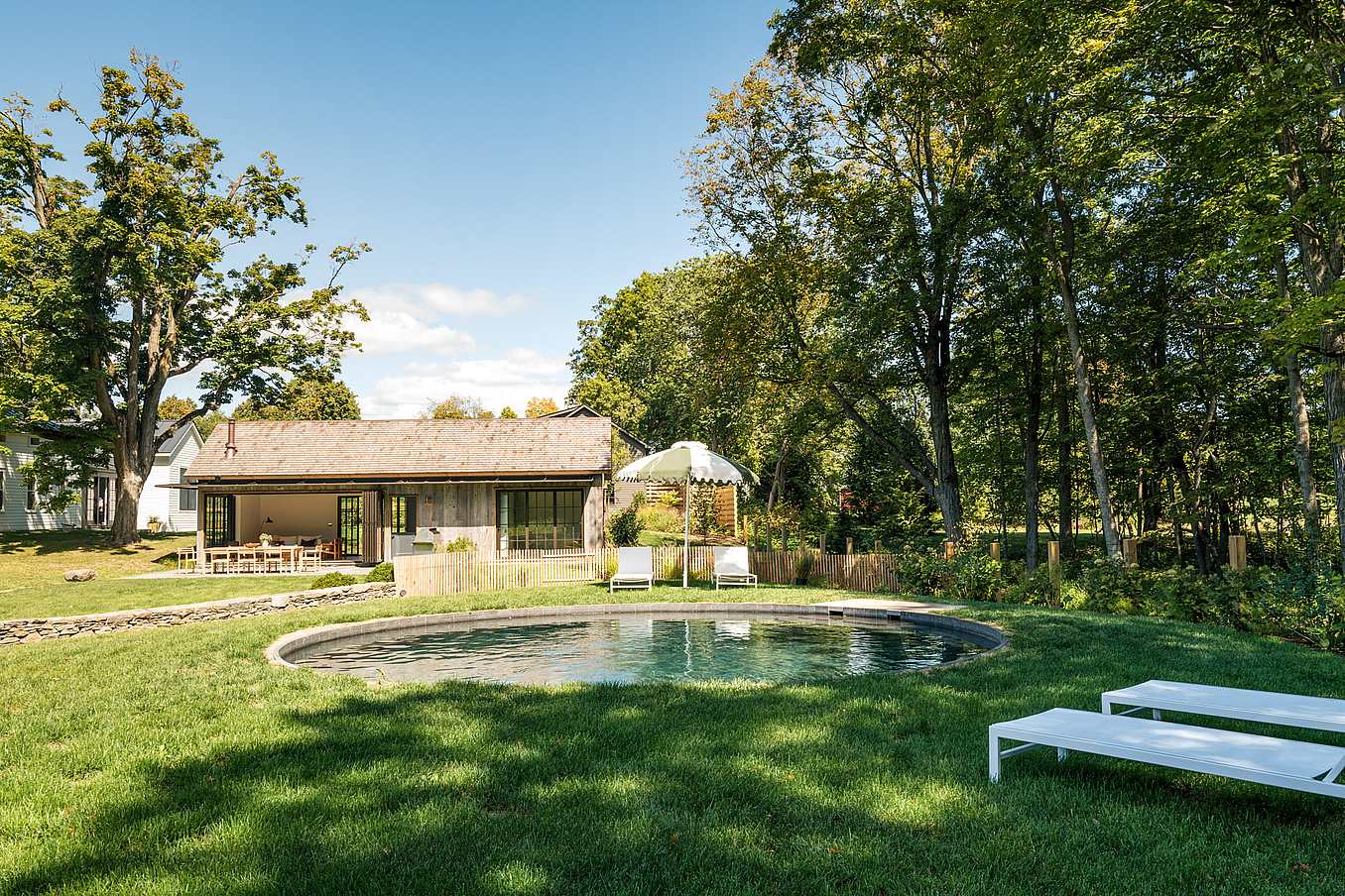 ADU designed with barn-inspiration and NanaWall folding patio doors