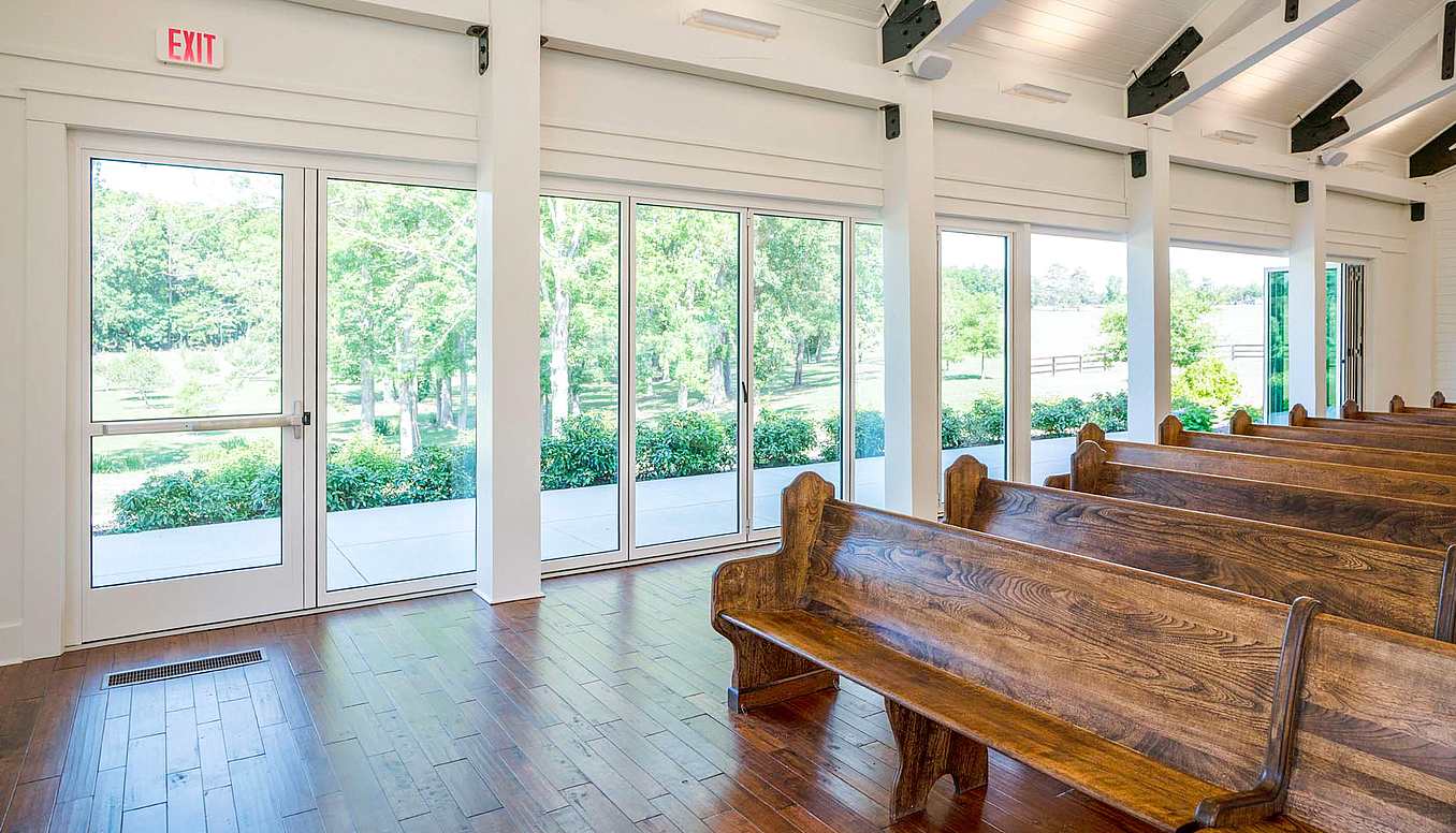 commercial swing door in bifolding glass door system