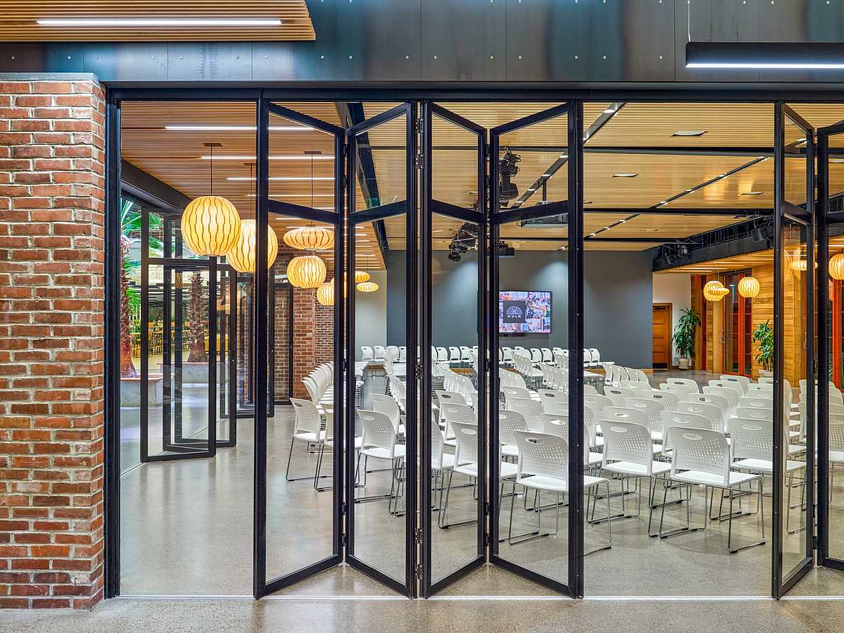 Interior folding glass walls with floating panels 