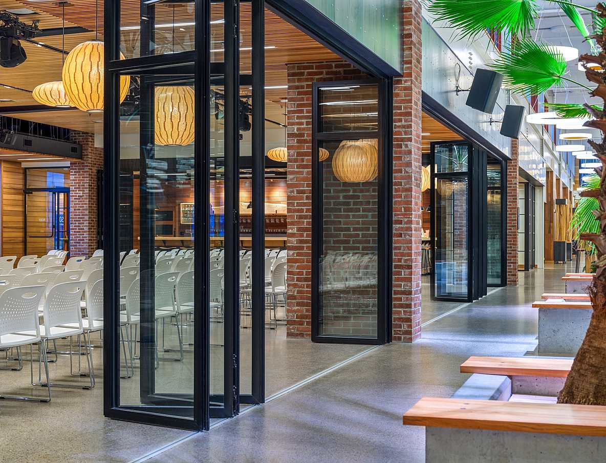 Coworking campus with interior folding glass walls 