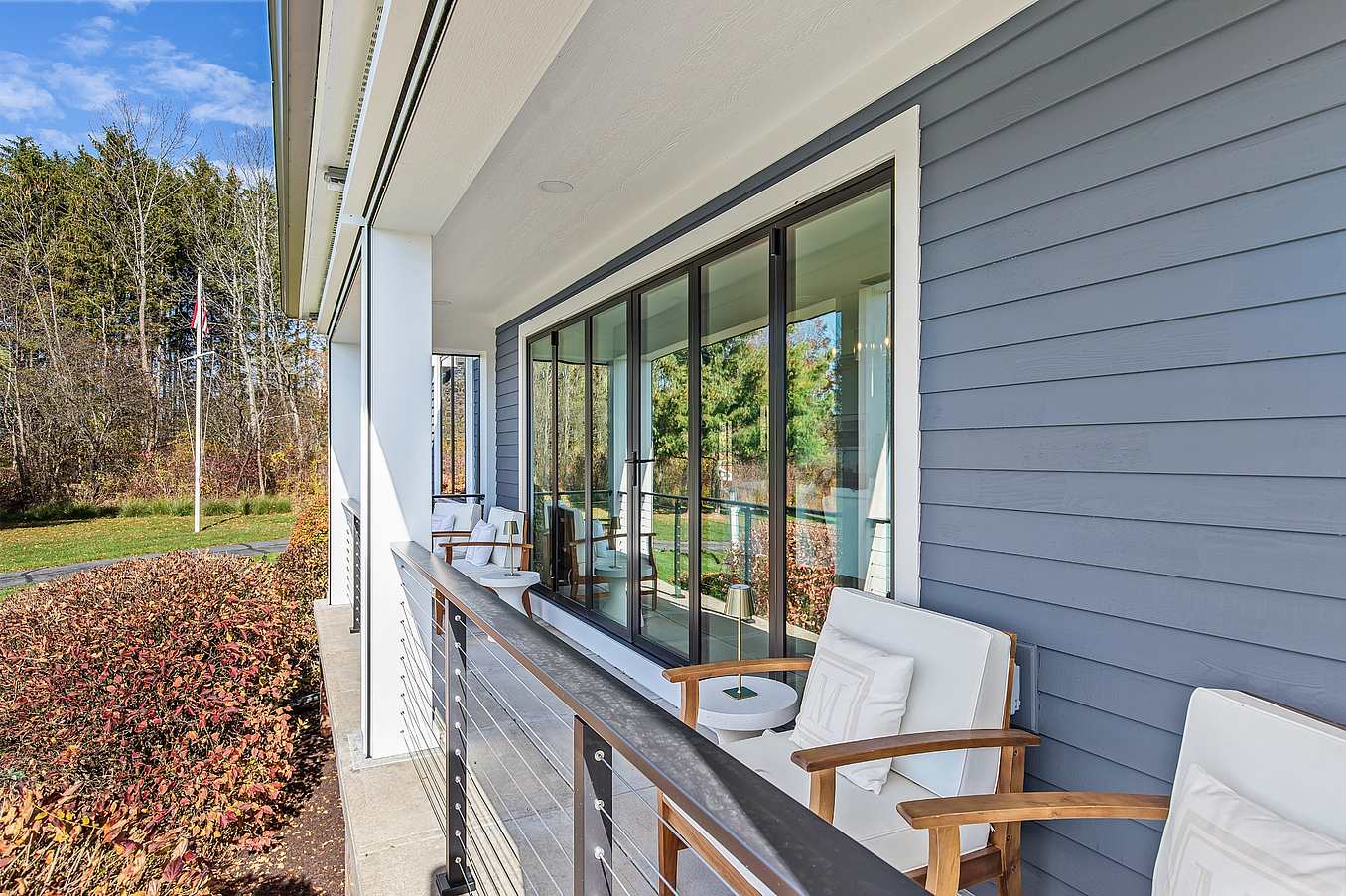 NanaWall Generation 4 bifold glass doors in a lakefront remodel