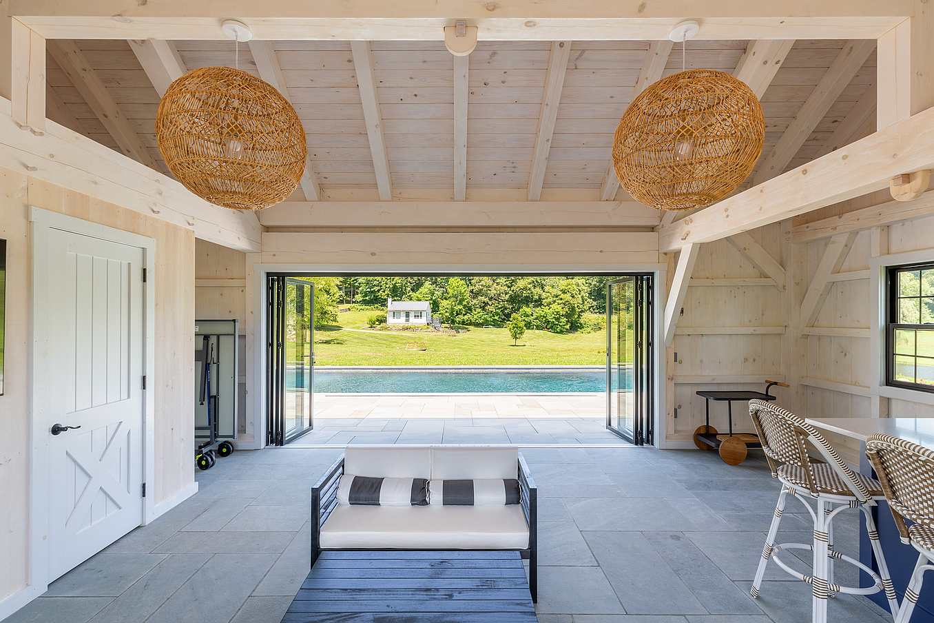 barn-inspired ADU with NanaWall folding glass wall