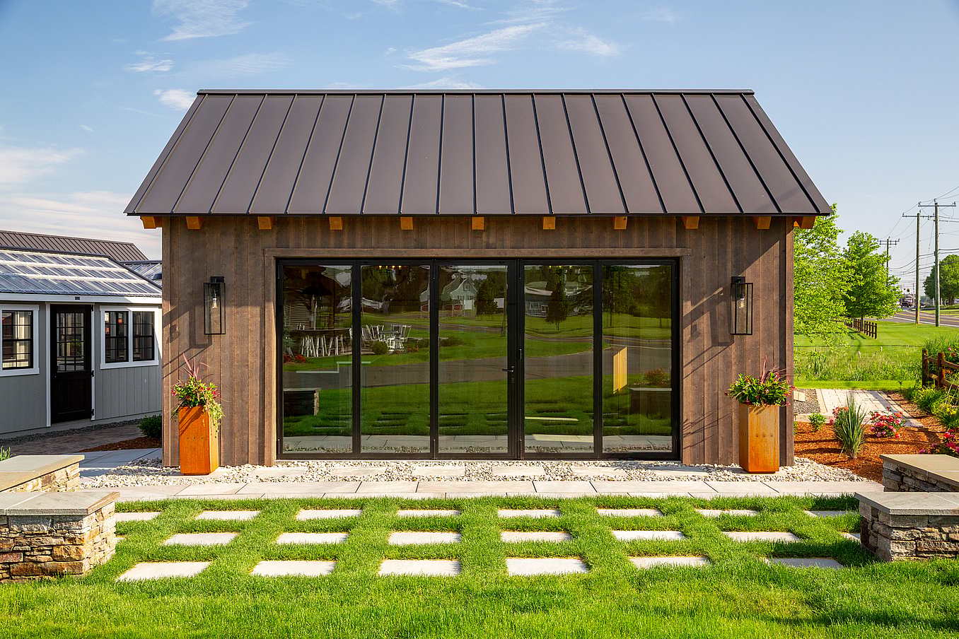 aluminum framed folding glass walls in Barn Yard ADU