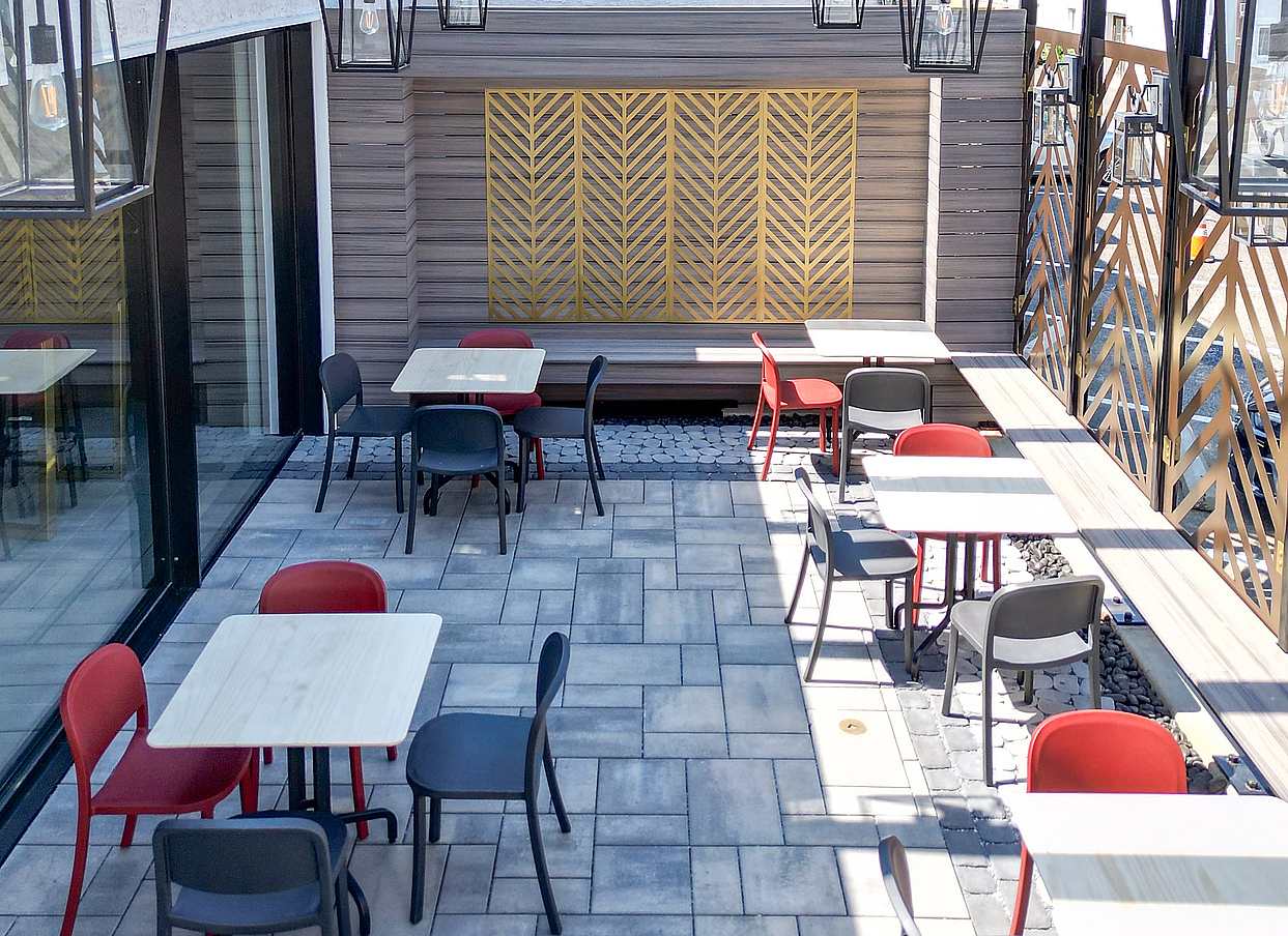 patio in retail design with commercial sliding glass wall
