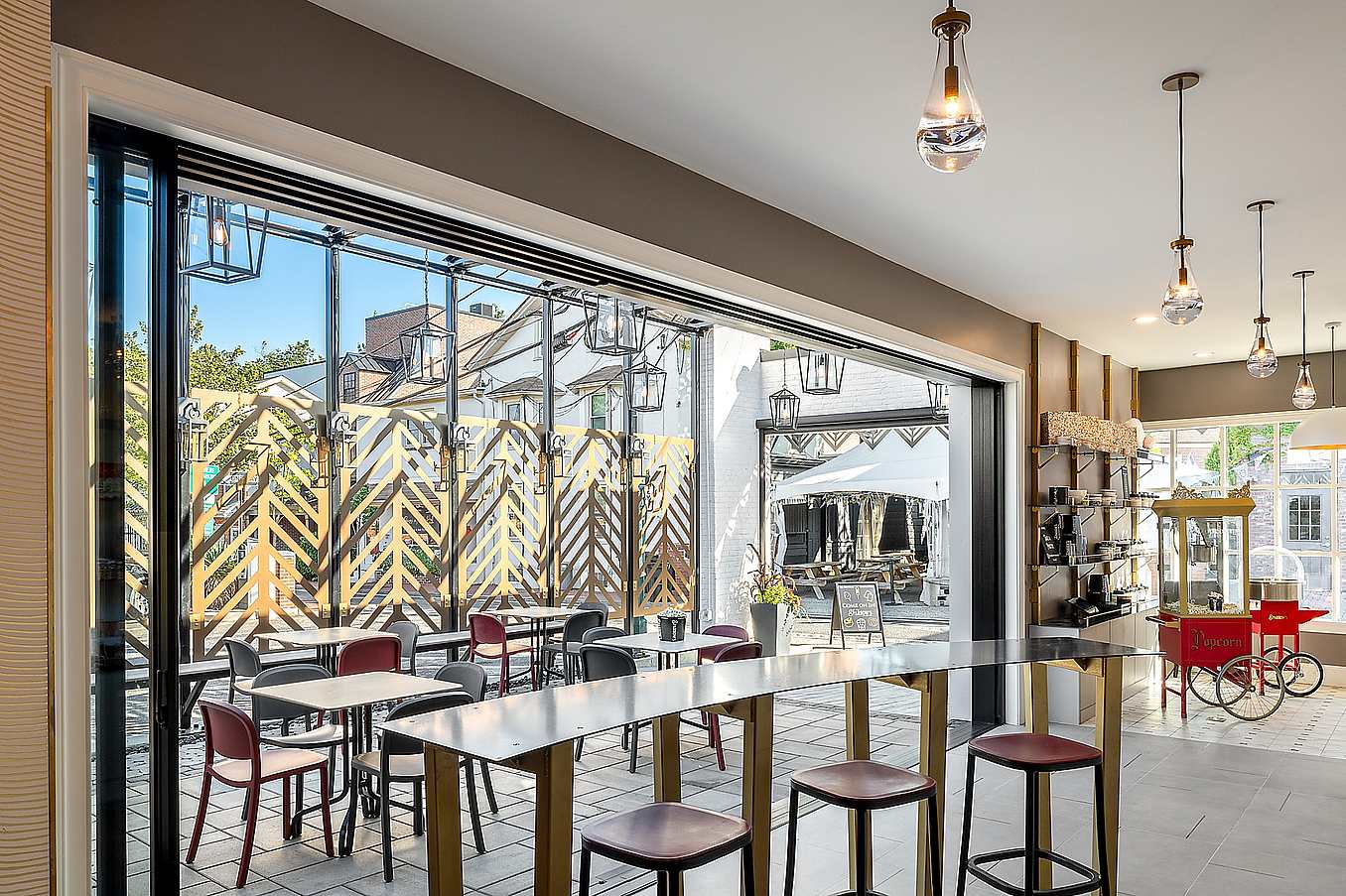 pocketed commericial sliding glass wall system with NanaWall