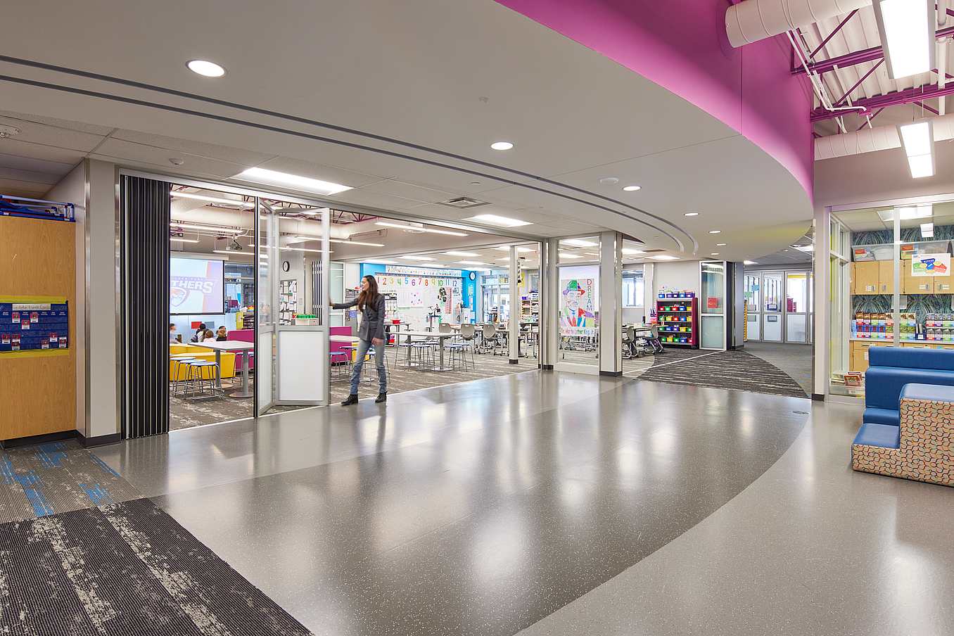 school design with retractable folding glass walls