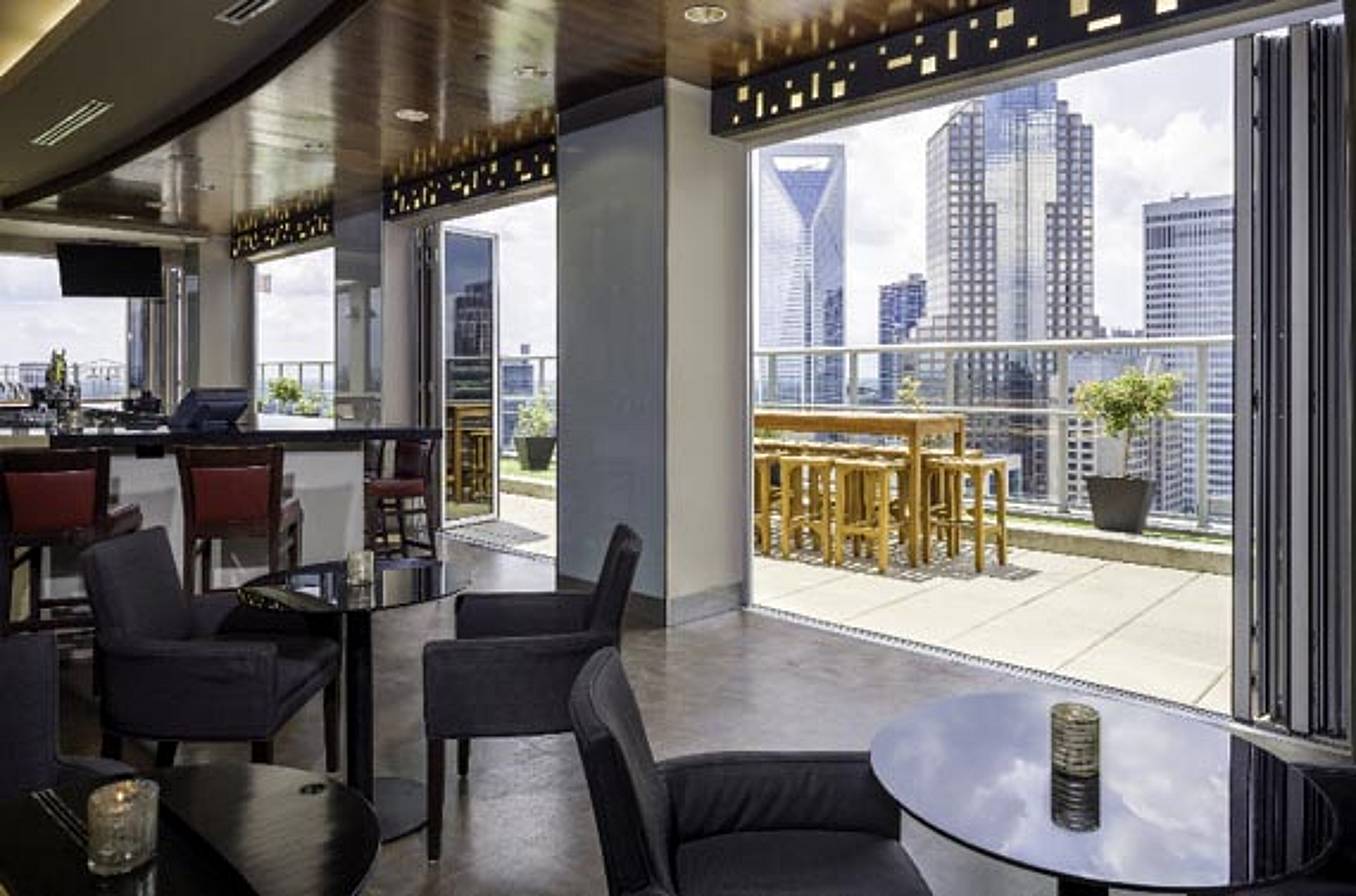 Folding-Glass-Walls-Systems-Used-for-Top-Floor-Restaurant