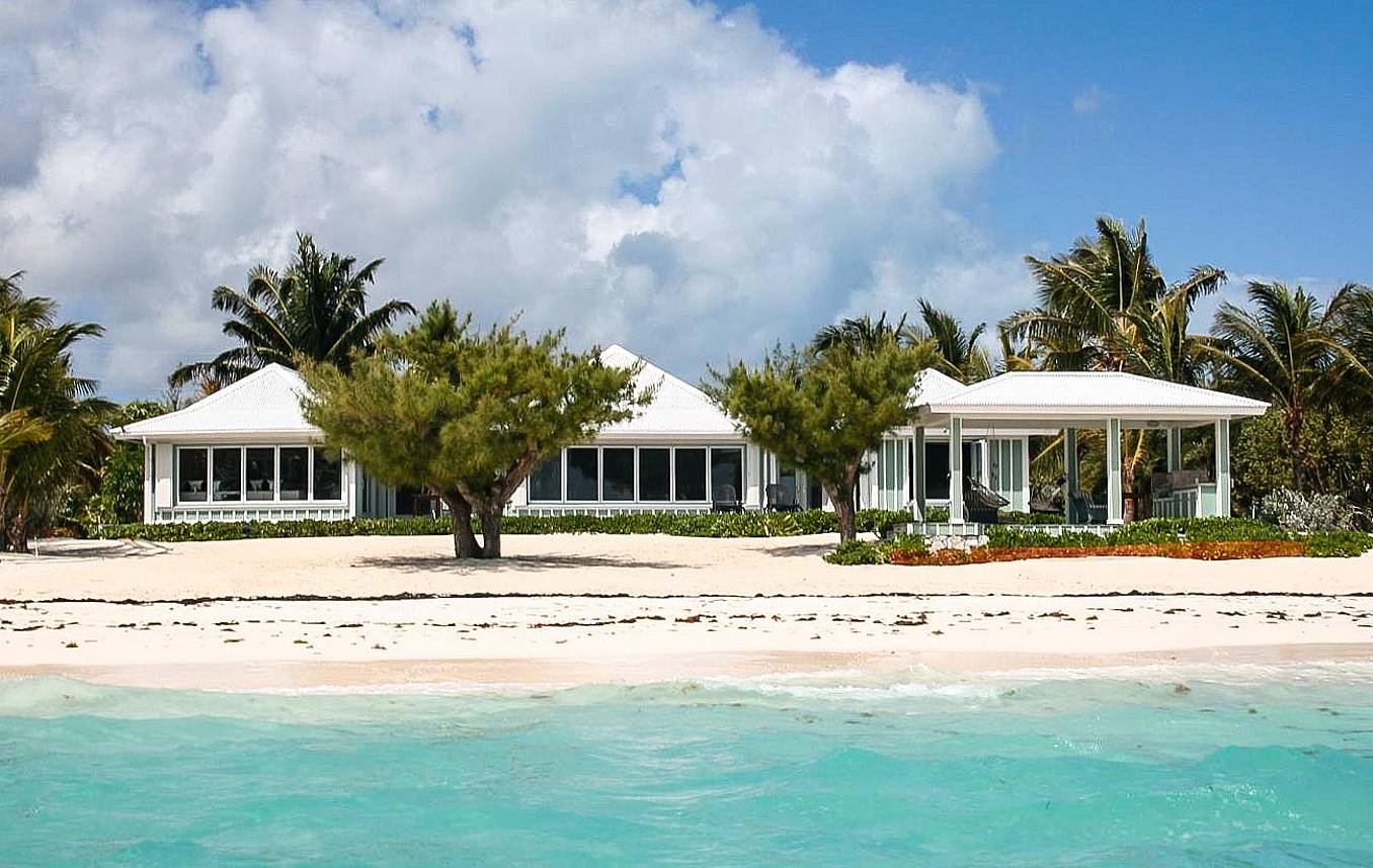 vacation home with folding glass windows with windload resistance for hurricane season