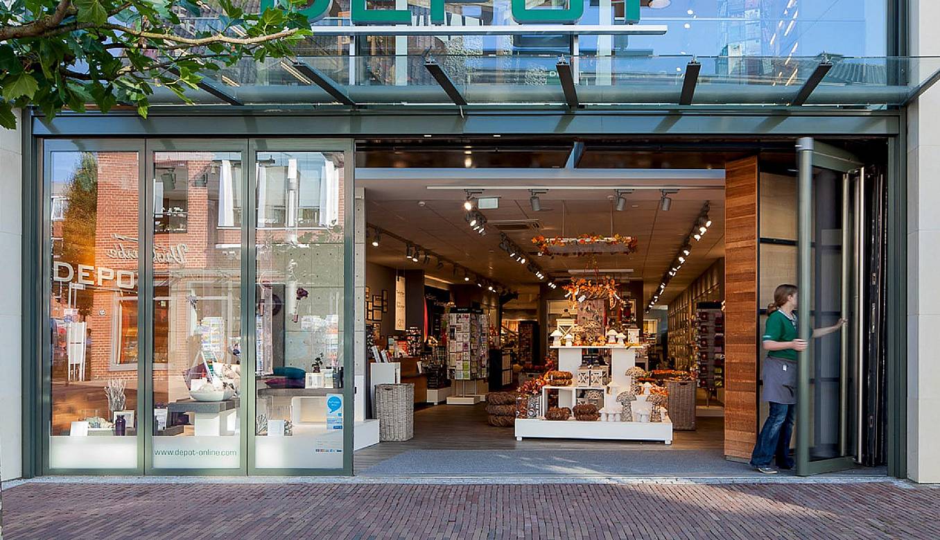 commercial design retail storefronts with moveable glass wall being opened
